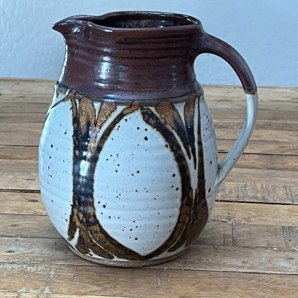 Vintage Stoneware Pitcher 7.5 in Two Tone Brown Drip Glaze White Speckled Body